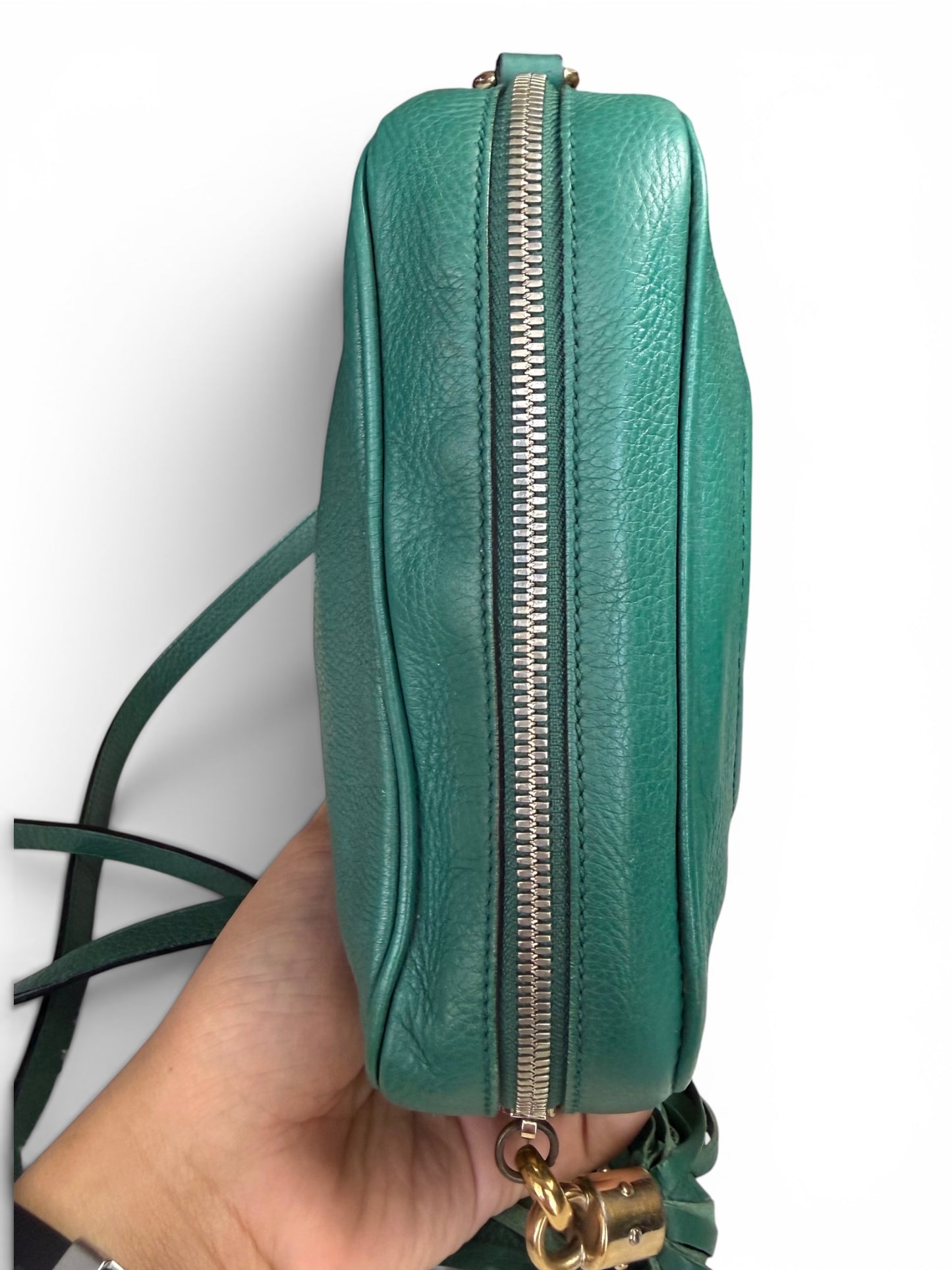 Gucci Soho Disco bag is crafted from green pebbled leather