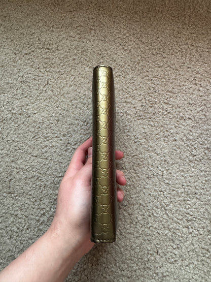 Gucci zippy heart wallet monogram gold