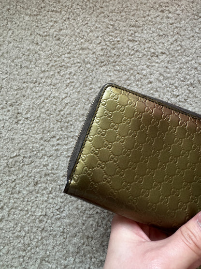 Gucci zippy heart wallet monogram gold