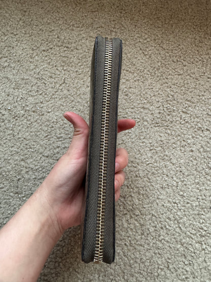 Gucci zippy heart wallet monogram gold