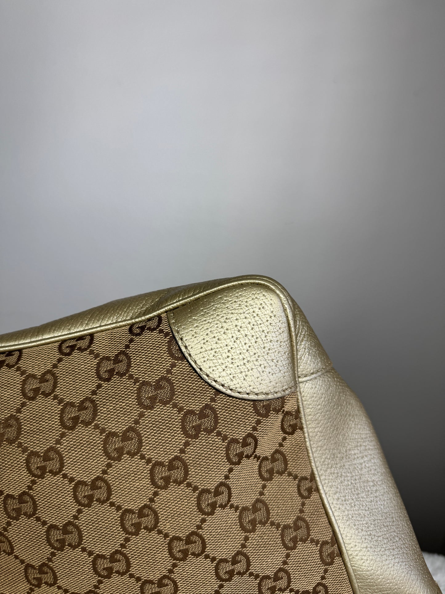 GUCCI Bree Small Handbag GG Canvas metallic Gold