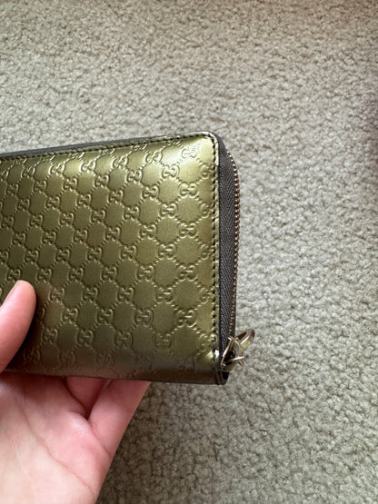 Gucci zippy heart wallet monogram gold