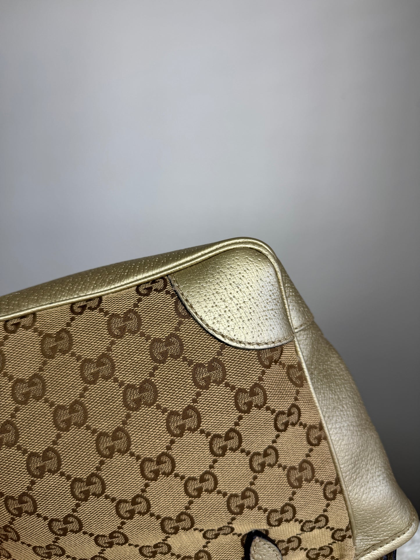 GUCCI Bree Small Handbag GG Canvas metallic Gold