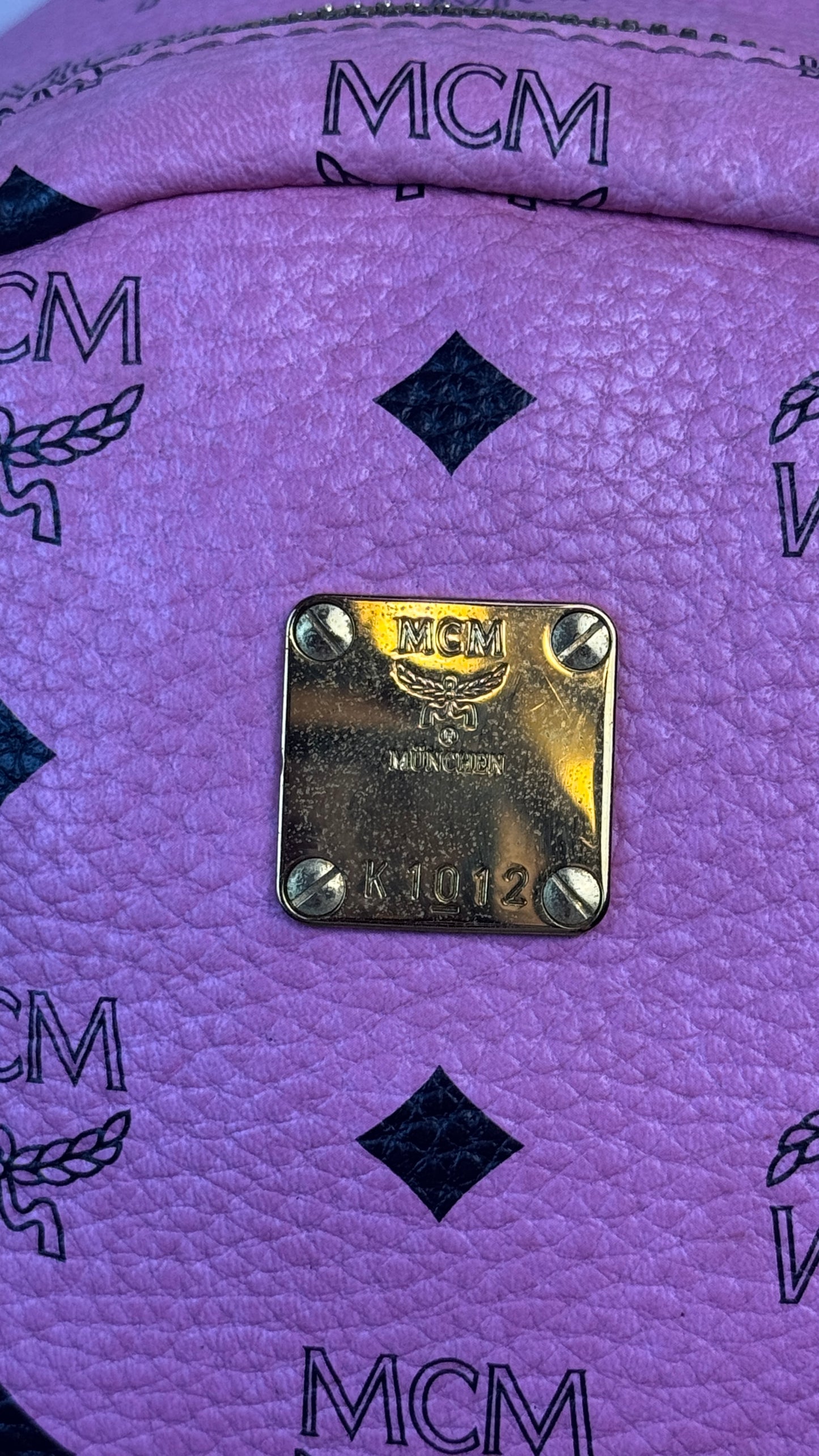 MCM Pink Visetos Stark backpack with gold-toned hardwar