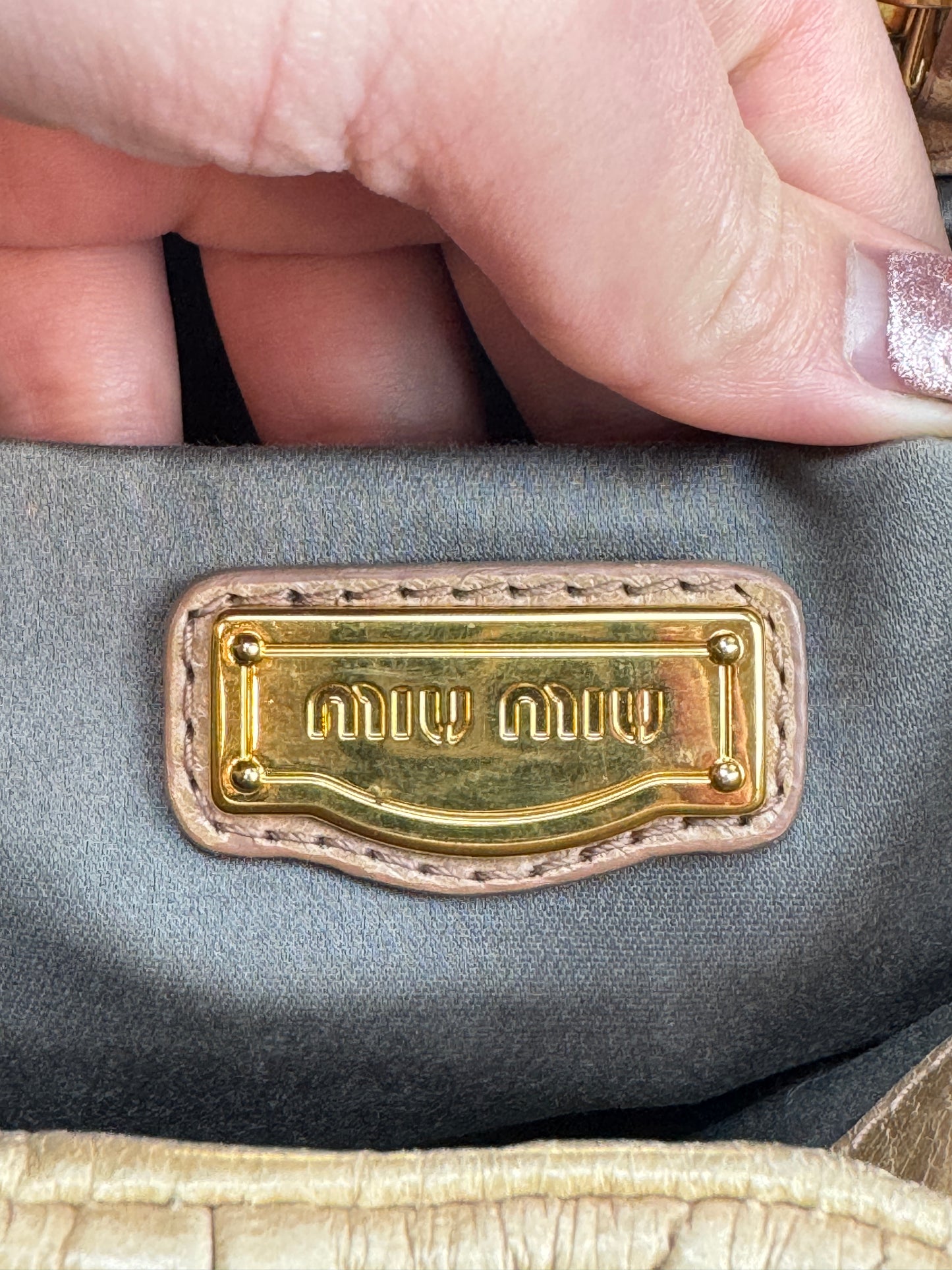 Miumiu Matelasse handle beige leather