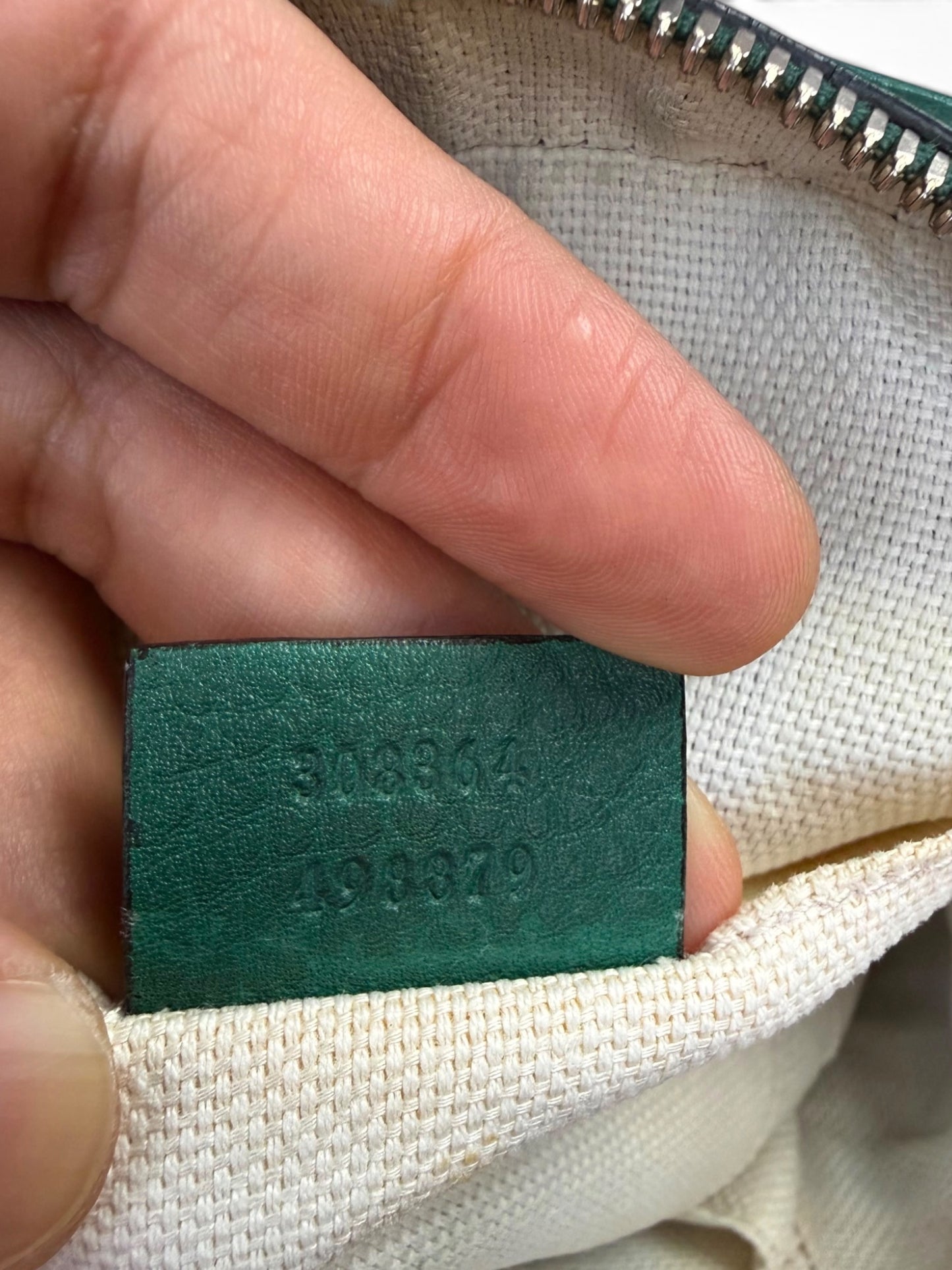 Gucci Soho Disco bag is crafted from green pebbled leather
