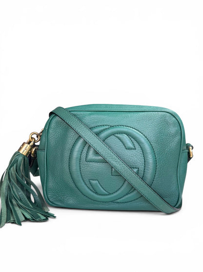 Gucci Soho Disco bag is crafted from green pebbled leather