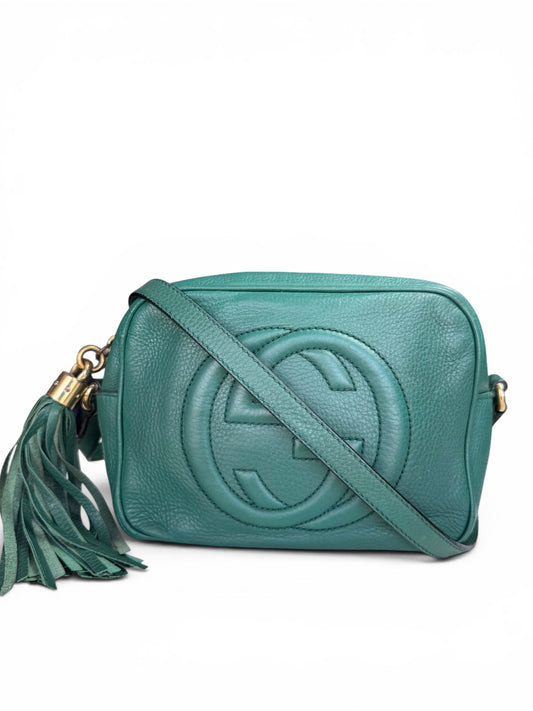 Gucci Soho Disco bag is crafted from green pebbled leather
