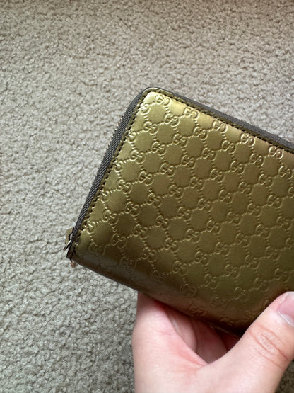 Gucci zippy heart wallet monogram gold