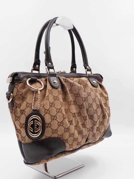 Gucci sukey  top handle monogram with strap