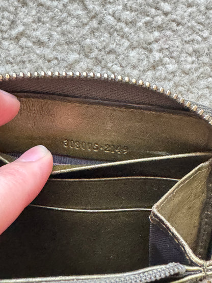 Gucci zippy heart wallet monogram gold