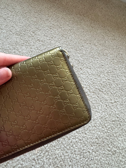 Gucci zippy heart wallet monogram gold
