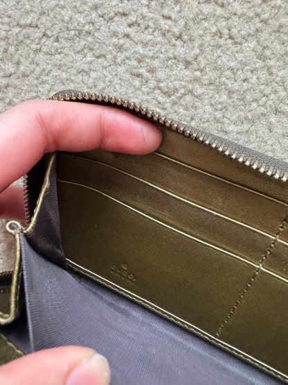 Gucci zippy heart wallet monogram gold