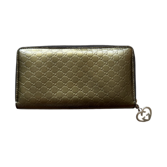 Gucci zippy heart wallet monogram gold