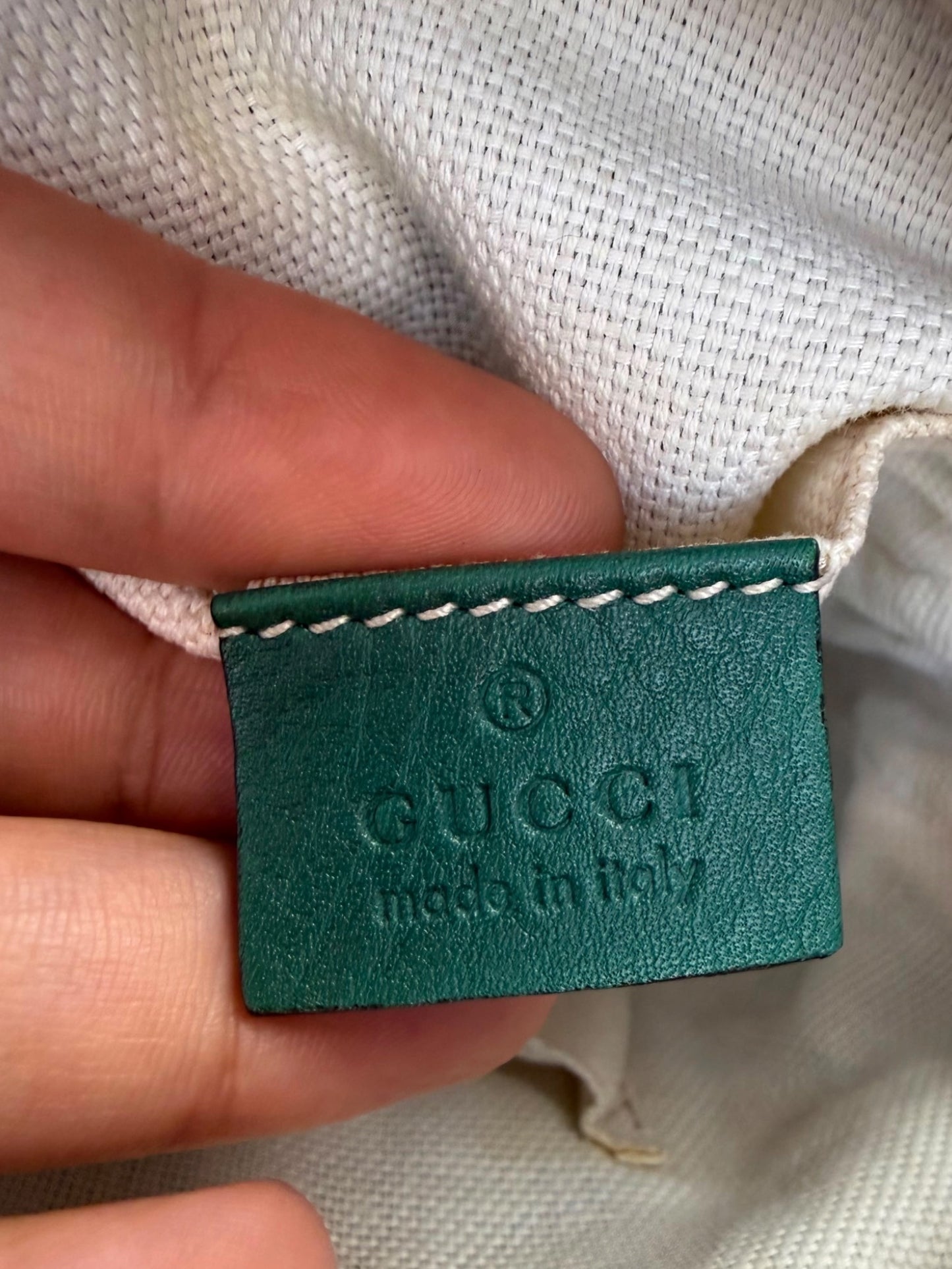 Gucci Soho Disco bag is crafted from green pebbled leather